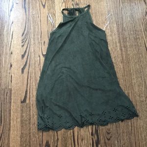 Green shift dress with detailing on the bottom